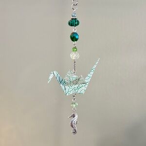 Origami Ornament #2400 - Small Crane with Seahorse Charm
